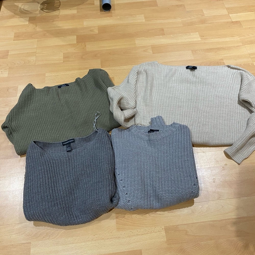 Set of Four Knit Sweaters in Neutral Tones
